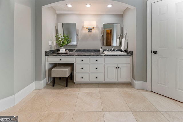 bathroom featuring baseboards, vanity, recessed lighting, and tile patterned flooring