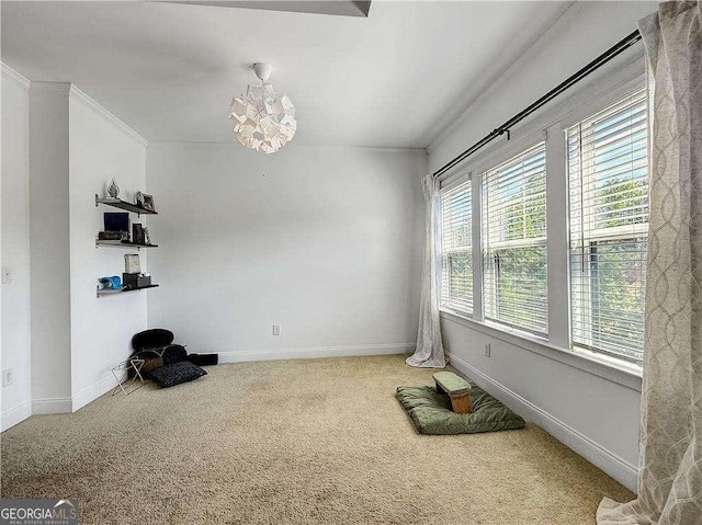 1127 Provence Ln, Decatur, GA 30033 - carpeted empty room featuring baseboards, crown molding, and a chandelier