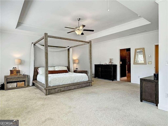 1127 Provence Ln, Decatur, GA 30033 - carpeted bedroom featuring a tray ceiling, ornamental molding, and ceiling fan