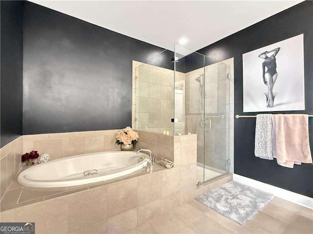 1127 Provence Ln, Decatur, GA 30033 - bathroom featuring a shower stall, a bath, and tile patterned flooring