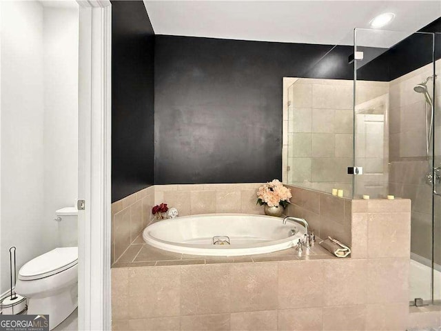 1127 Provence Ln, Decatur, GA 30033 - full bath featuring a shower stall, a garden tub, and toilet