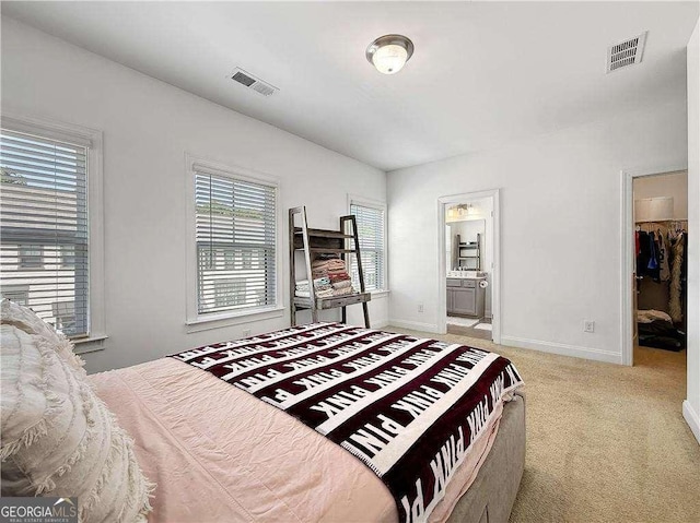 1127 Provence Ln, Decatur, GA 30033 - bedroom featuring carpet, a spacious closet, baseboards, and ensuite bathroom