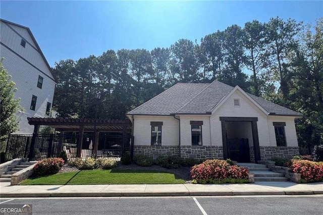 1127 Provence Ln, Decatur, GA 30033 - view of front of house with a pergola, fence, brick siding, and stone siding