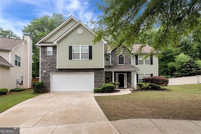 3265 Watson Gate Rd, Loganville, GA 30052 - traditional-style home featuring stone siding, a garage, and concrete driveway