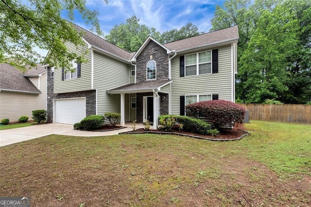 3265 Watson Gate Rd, Loganville, GA 30052 - traditional home with stone siding, driveway, and an attached garage