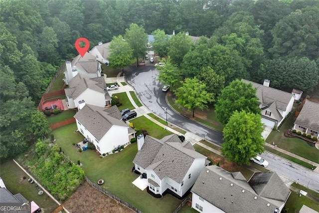 3265 Watson Gate Rd, Loganville, GA 30052 - aerial view of residential area with a heavily wooded area