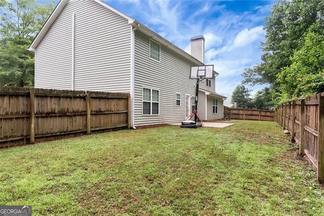 3265 Watson Gate Rd, Loganville, GA 30052 - rear view of property featuring a chimney, a patio, and a balcony