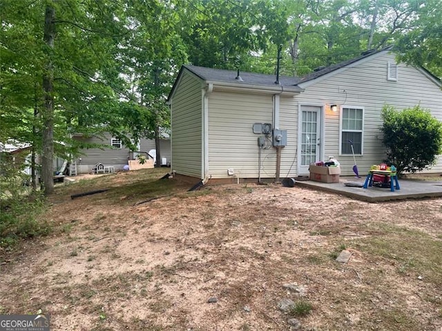 248 Dreamland Cir, Winder, GA 30680 - back of house featuring a patio