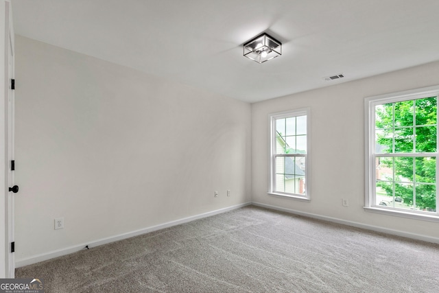 3153 Daleview Way SW, Atlanta, GA 30331 - unfurnished room with healthy amount of natural light and carpet
