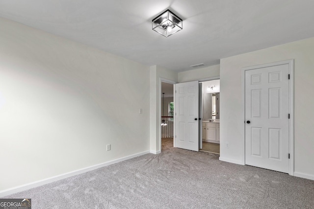3153 Daleview Way SW, Atlanta, GA 30331 - unfurnished bedroom featuring carpet and connected bathroom