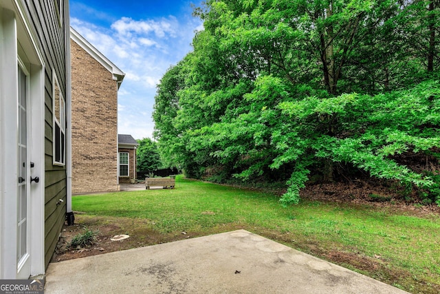 3153 Daleview Way SW, Atlanta, GA 30331 - view of green lawn featuring a patio