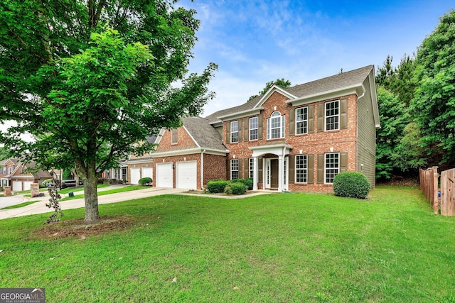 3153 Daleview Way SW, Atlanta, GA 30331 - georgian-style home featuring brick siding, a garage, driveway, and a shingled roof