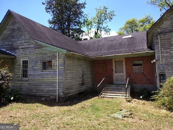 2005 Thairdell Rd, Rockledge, GA 30454 - view of front of home with a front lawn and entry steps