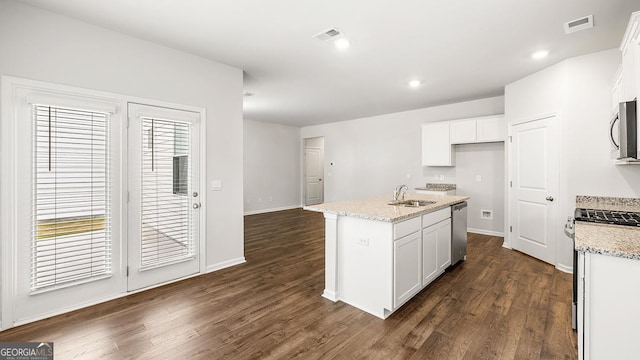 241 Lauritsen Way, Newnan, GA 30265 - kitchen with a sink, stainless steel appliances, dark wood-type flooring, white cabinets, and recessed lighting