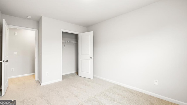 241 Lauritsen Way, Newnan, GA 30265 - unfurnished bedroom featuring carpet floors, baseboards, and a closet