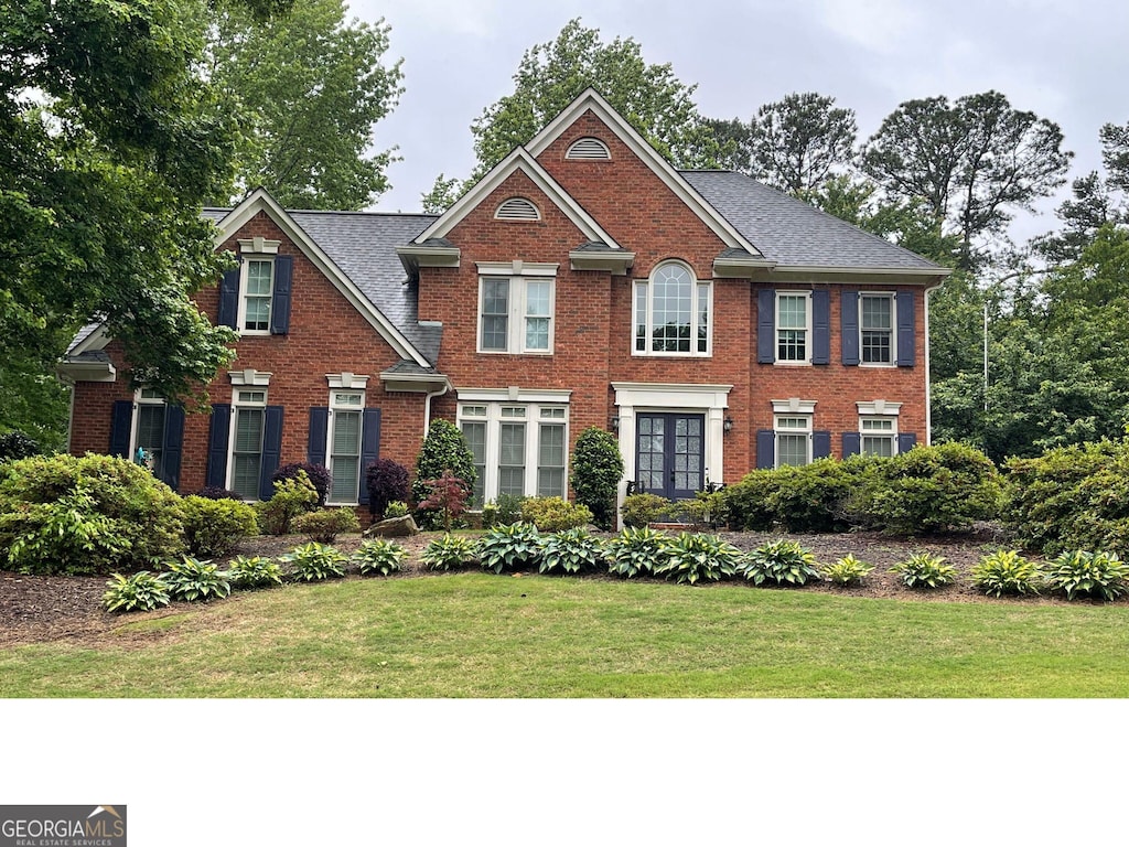 710 Devon Hill Ct, Roswell, GA 30075 - view of front of property with brick siding and a front lawn