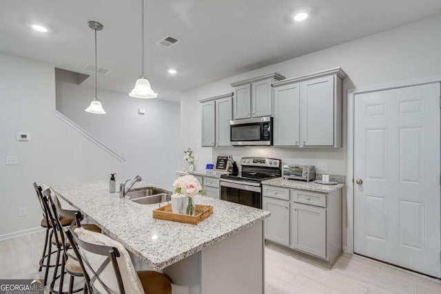 3426 Abbey Way, Gainesville, GA 30507 - kitchen with appliances with stainless steel finishes, a sink, gray cabinets, and recessed lighting