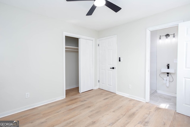 3193 Trasher Cir, Decatur, GA 30032 - unfurnished bedroom featuring wood finished floors, baseboards, ensuite bathroom, a closet, and ceiling fan
