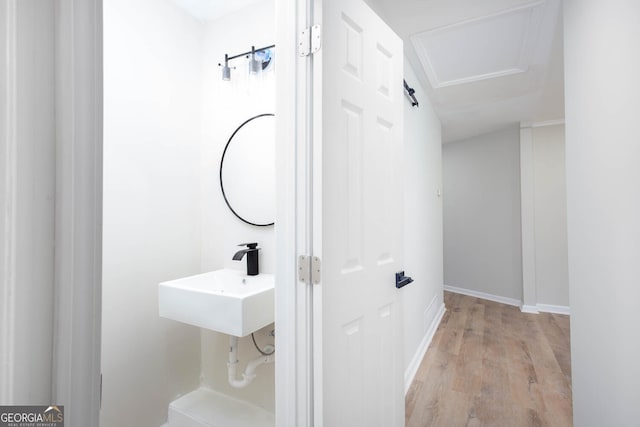 3193 Trasher Cir, Decatur, GA 30032 - bathroom featuring wood finished floors, a sink, and baseboards