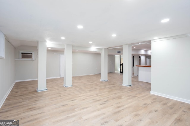 3193 Trasher Cir, Decatur, GA 30032 - finished below grade area with a wall unit AC, light wood-type flooring, recessed lighting, and baseboards