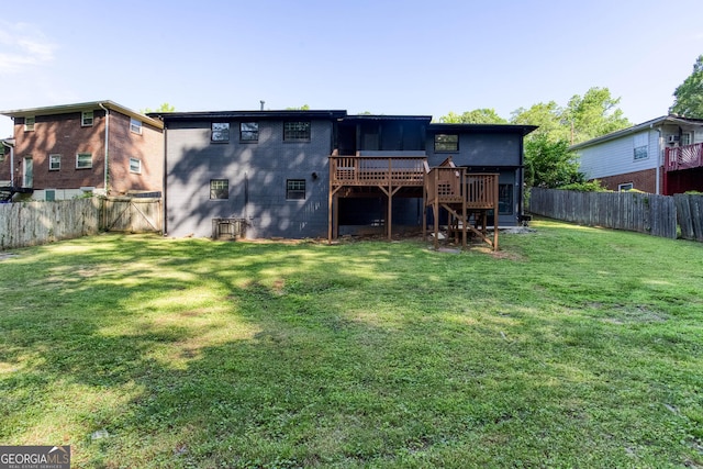 3193 Trasher Cir, Decatur, GA 30032 - back of property featuring stairs, a wooden deck, and a sunroom