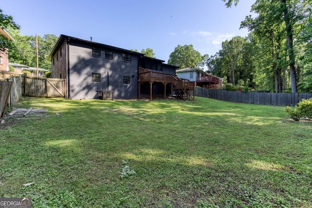 3193 Trasher Cir, Decatur, GA 30032 - view of yard with stairway, a deck, and a gate