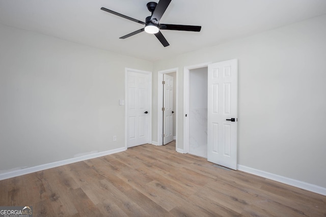 3193 Trasher Cir, Decatur, GA 30032 - unfurnished bedroom with wood finished floors, baseboards, and a ceiling fan