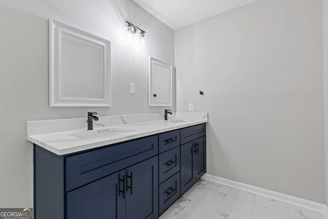 4657 Lou Ivy Rd, Peachtree Corners, GA 30096 - bathroom with marble finish floors, baseboards, and double vanity
