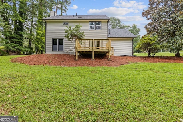 4657 Lou Ivy Rd, Peachtree Corners, GA 30096 - rear view of house featuring a wooden deck, a yard, and a chimney