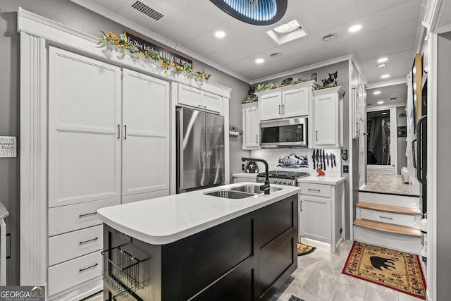 344 Choestoe Falls Cir, Blairsville, GA 30512 - kitchen featuring stainless steel appliances, a sink, light countertops, ornamental molding, and white cabinets