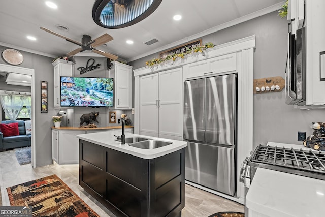 344 Choestoe Falls Cir, Blairsville, GA 30512 - kitchen featuring stainless steel appliances, a sink, crown molding, light countertops, and recessed lighting