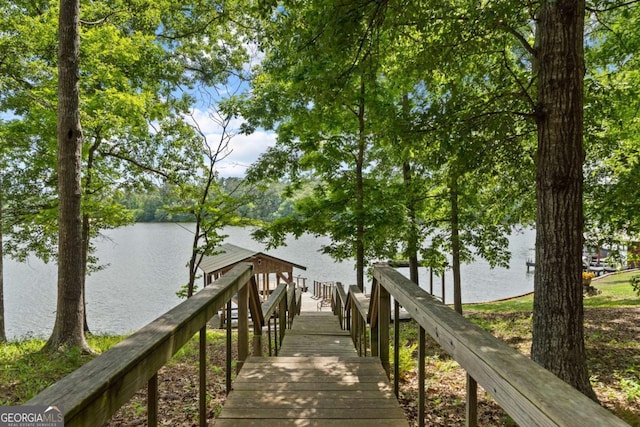 view of home's community featuring a water view
