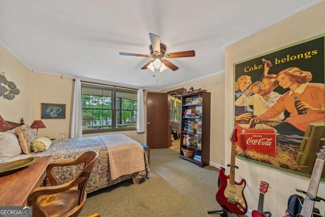 bedroom featuring ornamental molding, carpet floors, and ceiling fan