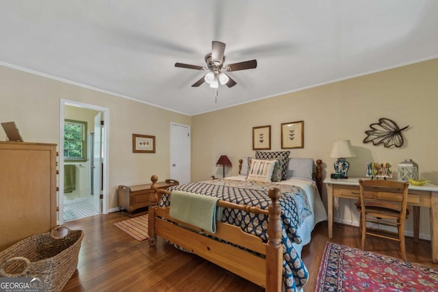 bedroom featuring wood finished floors, crown molding, ensuite bath, and a ceiling fan