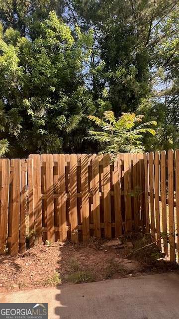 7055 Blairs View Dr Unit 1, Austell, GA 30168 - view of yard with fence