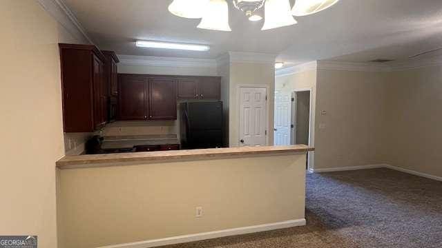 7055 Blairs View Dr Unit 1, Austell, GA 30168 - kitchen with freestanding refrigerator, crown molding, a peninsula, carpet, and dark brown cabinetry