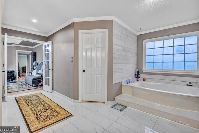 4250 Edgewater Ct NW, Kennesaw, GA 30144 - full bathroom featuring a bath, crown molding, baseboards, a textured ceiling, and wood walls