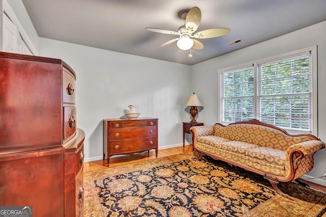 4250 Edgewater Ct NW, Kennesaw, GA 30144 - sitting room with a ceiling fan, light wood-style floors, and baseboards