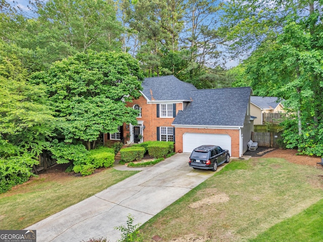 4250 Edgewater Ct NW, Kennesaw, GA 30144 - view of front of house featuring an attached garage, driveway, brick siding, and a shingled roof