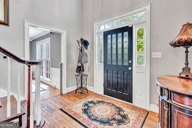 4250 Edgewater Ct NW, Kennesaw, GA 30144 - entrance foyer with light wood-type flooring, plenty of natural light, and stairway