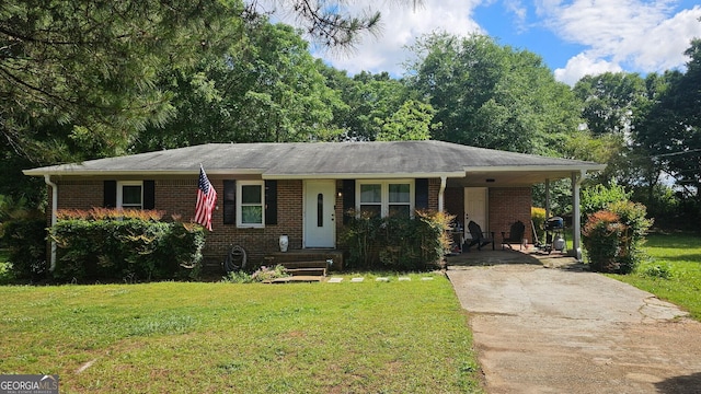 112 Hilltop Dr, Newborn, GA 30056 - view of front of house featuring brick siding, concrete driveway, a front yard, and a carport