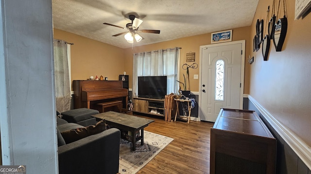 112 Hilltop Dr, Newborn, GA 30056 - living area with ceiling fan, a textured ceiling, and wood finished floors