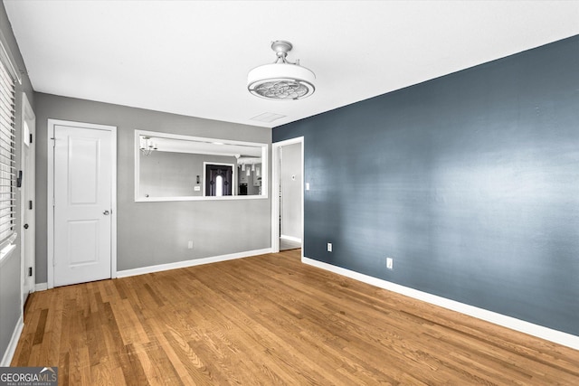 125 Sycamore Dr, Athens, GA 30606 - empty room featuring wood finished floors and baseboards
