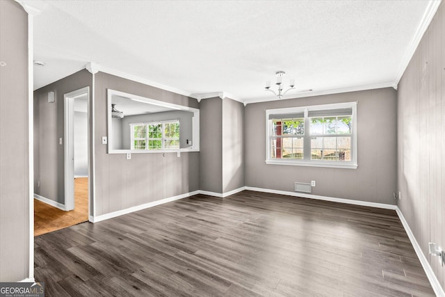 125 Sycamore Dr, Athens, GA 30606 - spare room featuring crown molding, a chandelier, wood finished floors, and a textured ceiling