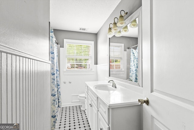 125 Sycamore Dr, Athens, GA 30606 - bathroom featuring vanity and wainscoting