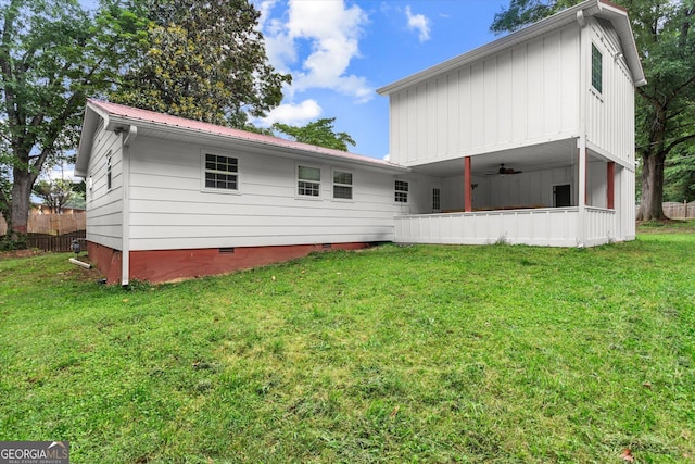 125 Sycamore Dr, Athens, GA 30606 - back of house with ceiling fan, a yard, crawl space, and a metal roof