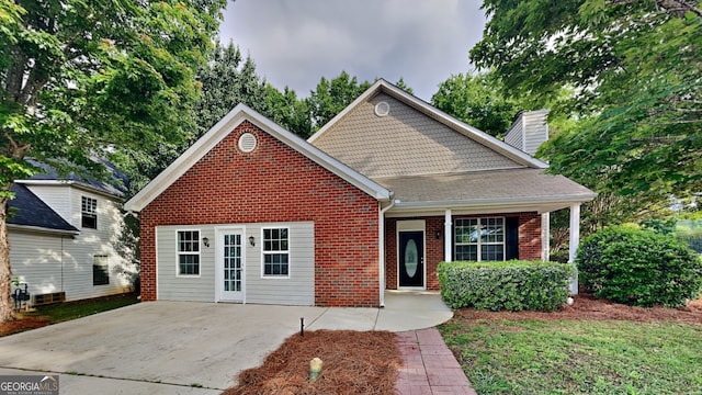 700 Patriots Point St, Locust Grove, GA 30248 - traditional home with brick siding and a chimney
