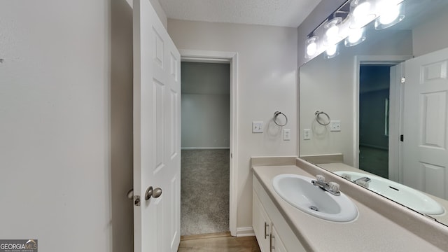 700 Patriots Point St, Locust Grove, GA 30248 - bathroom featuring vanity and a textured ceiling