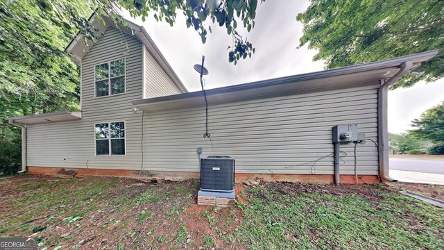 700 Patriots Point St, Locust Grove, GA 30248 - view of home's exterior with cooling unit