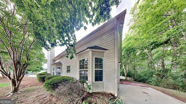 700 Patriots Point St, Locust Grove, GA 30248 - view of home's exterior with a patio area